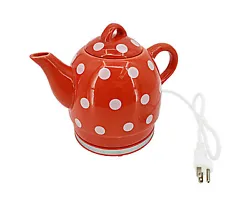 Kettle/ teapot. Electric Kettle. Boils water, yet. has substantial ceramic teapot touch and feel. An Elegant Polka Dot...
