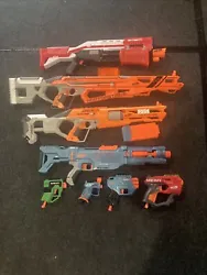 Nerf lot, guns in good working condition.Please see pics for what is included.