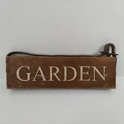 Topped with weathered leather strap and buckle for hanging. Solid wood sign with painted white letters and black...
