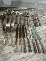 Set Includes 7 Butter Knives. 8 Salad Forks.