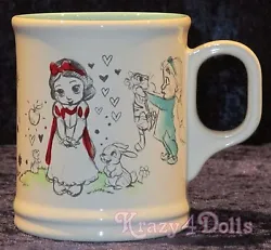 Screen art includes youthful sketches of Snow White, Tinker Bell, Jasmine, Pocahontas, and Rapunzel. Hot beverage mug.