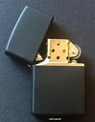 Zippo item # 218BI. Zippo Black Matte Lighter with Gold Insert. Finish: Black Matte. Go For the Gold!