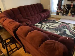 Couch. 6 seater couch in goo condition , Has a tear on one of the arm rest, reclines on one of these seats Bonus- can...