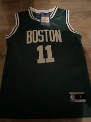 This is kids size Large of Kyrie Irving Boston Celtics