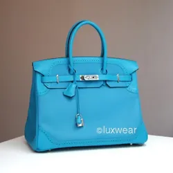 Made from Svift and Togo leather. Color : Turquoise Blue. Silver Palladium hardware. Year 2015 T.