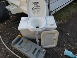 Thetford toilet. Toilet in good condition with the 12volt pump flush. nice and white, the seat cover may have very...