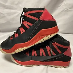 Nike Air Jordan Black /red Size1Y. Condition is Pre-owned. Shipped with USPS Priority Mail ,shoelace holder on tongue...
