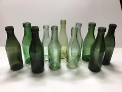 This are various shades of green colored bottle. They are dug bottle with light ground patina. Maybe a flea bite in...