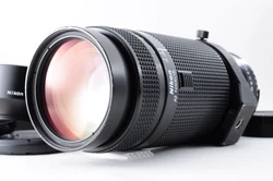 Nikon AF Nikkor 75-300mm F4.5-5.6 Zoom Lens. Rear cap(Nikon). Hood(Nikon HN-24). There are noticeable scratches around...