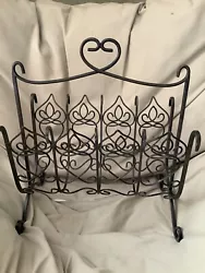 Black Davistown Magazine Rack from Southern Living. Condition is Used. Shipped with USPS Priority Mail.
