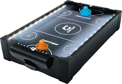 LED Light Up Table Top - The air hockey table features LED lights that illuminate the playing surface, creating a cool...