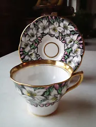 Cup and saucer marked “Rosina” with crown, “Bone China Made in England 4860” with “A1” after the number....