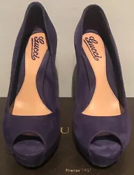 For sale are an authentic pair of preowned Gucci kid scamosciato purple suede heels in a size 37 (7). Really the only...