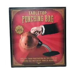 Tabletop Punching Bag takes an average, squeezable stress ball to a whole new level. Take no prisoners! Attached to a...