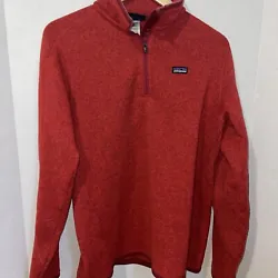 The jacket boasts a solid red color with a logo accent, providing a classic and stylish look that suits any occasion....