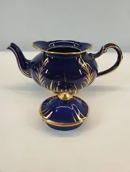 Type : Tea Pot. Material : Glass. Color : Blue. All appears to be in fair to good condition. See photos for details.