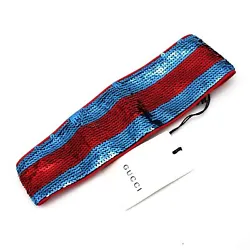Royal blue & red stripe sequin paillette headband. Red silk lining. Lining: 100% silk. Elastic stretch back inset....
