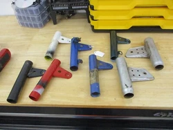 The only pair is the gray ones and they are used. The rest are all right hand headlight ears. The one green one is NOS...
