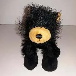 Webkinz black bear plush is in excellent pre-owned condition - very clean with no stains or bald spots. 7