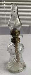 Vintage Oil Lamp Clear Glass 8” Tall. Lamp is in very nice condition. No chips or cracks. Has a wick. Please see...