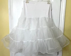 Crinoline petticoat slip size M white with underlayment 24 inches in length. Top part around waist is a stretchy...