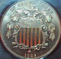 A beautiful coin in an early generation slab.