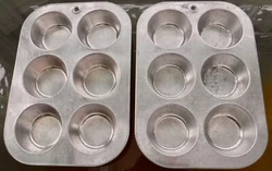 Makes up to 12 muffins or cupcakes, or use as rust-free drawer organizers. One pan engraved “Mirro, the Finest...