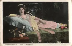 Publisher: The Philco Publishing Co. Title: Woman Reclining on Sofa: Miss Phyllis Dare. PHILCO SERIES 2071 E. MISS...