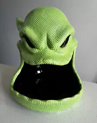 This Disney The Nightmare Before Christmas Oogie Boogie Halloween Candy Dish is a must-have for any collector. The...