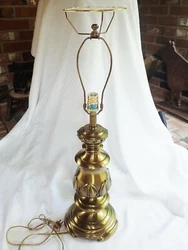 Just a note that the white you see around the top of the harp is residue from an old shade; it easily flakes off; I...