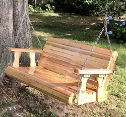 5 foot Cedar Wood Swing Bench with adjustable length chains. Ergonomic design. Bench has a curved edge where the knee...