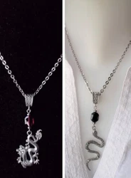 Ce collier avec un pendentif Dragon argenté ou bien un pendentif Serpent comporte un cristal Swarovski 12 mm.