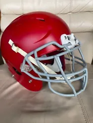 Gloss red with gray facemask, all interior pads and soft chinstrap. EXPIRED; not for competitive play.