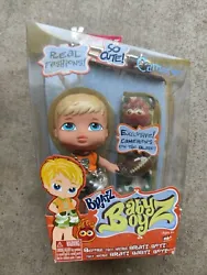 For sale is a new in box and hard to find Bratz Kidz Baby Bratz Cameron doll. Item is unopened and has been kept all...
