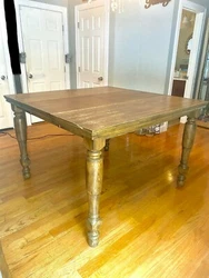 Rustic wood 5pc dining table set. The table size can be adjusted through the middle.