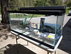 75 gallon aquarium fish tank and all shown accessories. Cash only at pickup.  