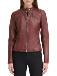Cool and stylish jacket in faux leather has a band collar with zip closure and four pockets. Band collar. Two waist zip...
