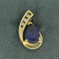 9x6 MM created sapphire pendant with diamond accents. 9.2 mm wide. 16.7 mm long.