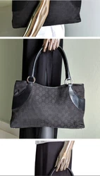 Gucci Black Canvas handbag. Please see my other listing with matching Gucci black canvas zippered pouch.