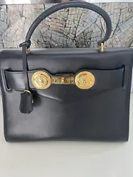 Vintage rare Gianni Versace Black Leather Gold Medusa Kelly BagExcellent preowned condition with no real visible...