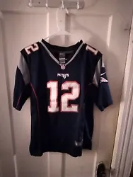 Very nice condition Boys Size xl (18) Blue Tom Brady Jersey,  you would receive the exact item in the photos, thanks