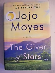 By Jojo Moyes. The Giver of Stars. This hardcover book is in very good condition and is clean and tight. The dust...