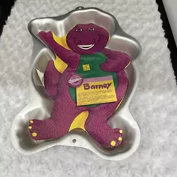 Add a little magic to your baking with this vintage Wilton Barney the Purple Dinosaur cake pan. A perfect addition for...