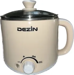 dezin electric hot pot. It is adjustable heat. Open box never used. 
