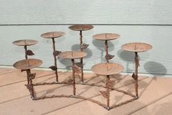 Rustic Fireplace Candle Holder.  It holds 8 candles.  It can hold large candles or small candles because it has...