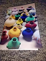 Plain paged sketchbook with cover designed by artist Ai Weiwei with coloured vases image. Ai Weiwei Hon RA. Stitched...