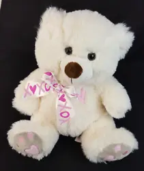 Cute Cream Colored Teddy Bear with a pink heart embroidered on the chest and Pink hearts on the paws and bow. 10