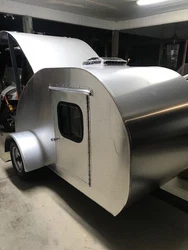Teardrop Camper Trailer for sale.  Never used, AC and Battery power, torsion suspension, extras include 12 x 12...