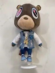 Still new with the tag and stand!This is the highest quality Graduation Bear plush so no surprise it sold out...