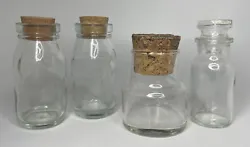 This lot is a pretty collection of both vintage & modern clear glass potion jars. Measurements are in photos. Glass jar...